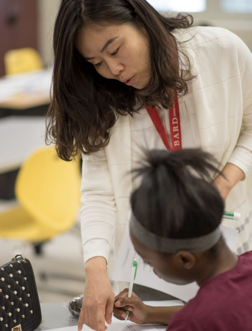 Instructor assisting student