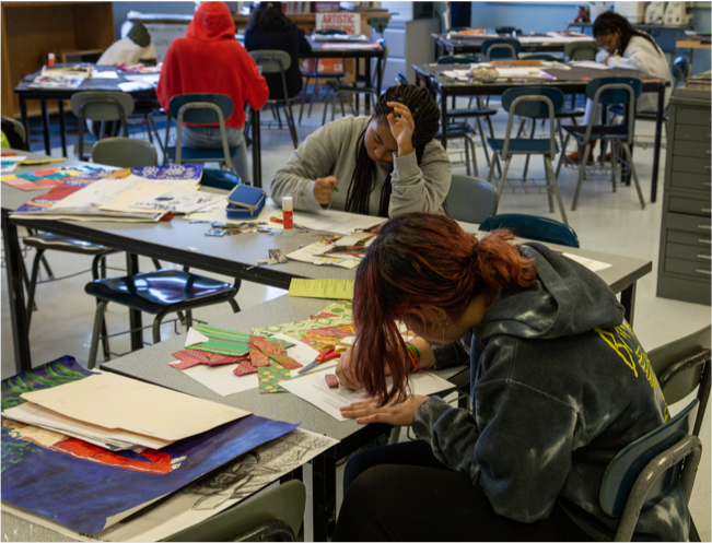 Two students working in a classroom